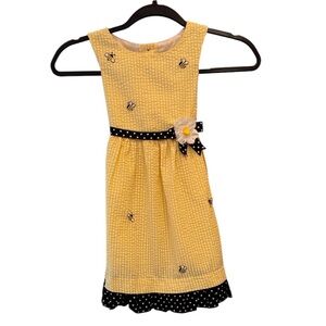Seersucker Yellow Bee Kids Dress with embroidered Bees.